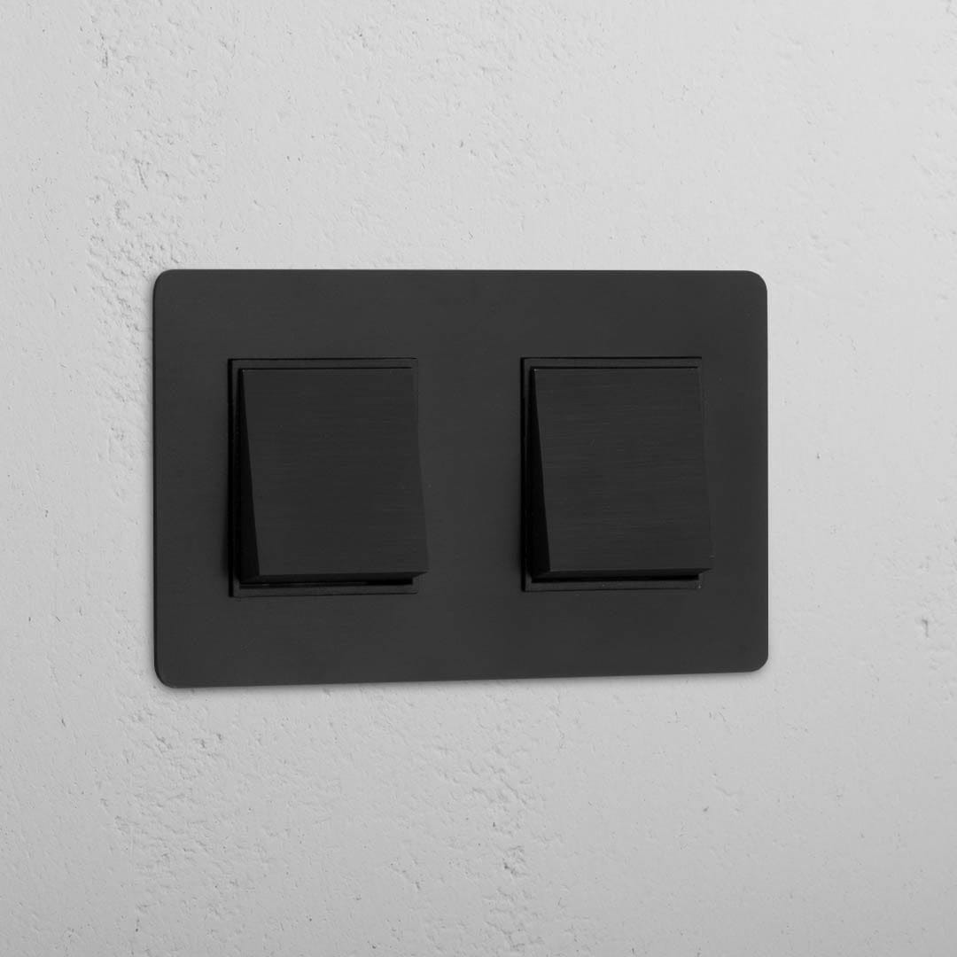 Interruptor de balancín de posición doble en bronce y negro - Detalle contemporáneo para el hogar