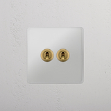 Interruptor individual de palanca en latón antiguo y traslúcido con dos posiciones - Solución elegante para control de luces, sobre fondo blanco