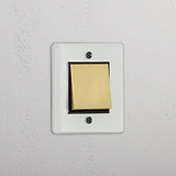 Interruptor individual de balancín retráctil en latón antiguo y traslúcido con negro - Solución fácil de usar para iluminación