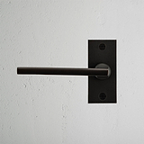 Manilla para puertas Clayton con placa corta (fija) - Bronce