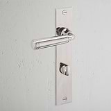 Manilla para puertas Digby con placa larga (con muelle) y sistema giratorio - Níquel pulido