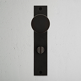 Pomo para puertas Onslow con placa larga (con muelle) y condena - Bronce