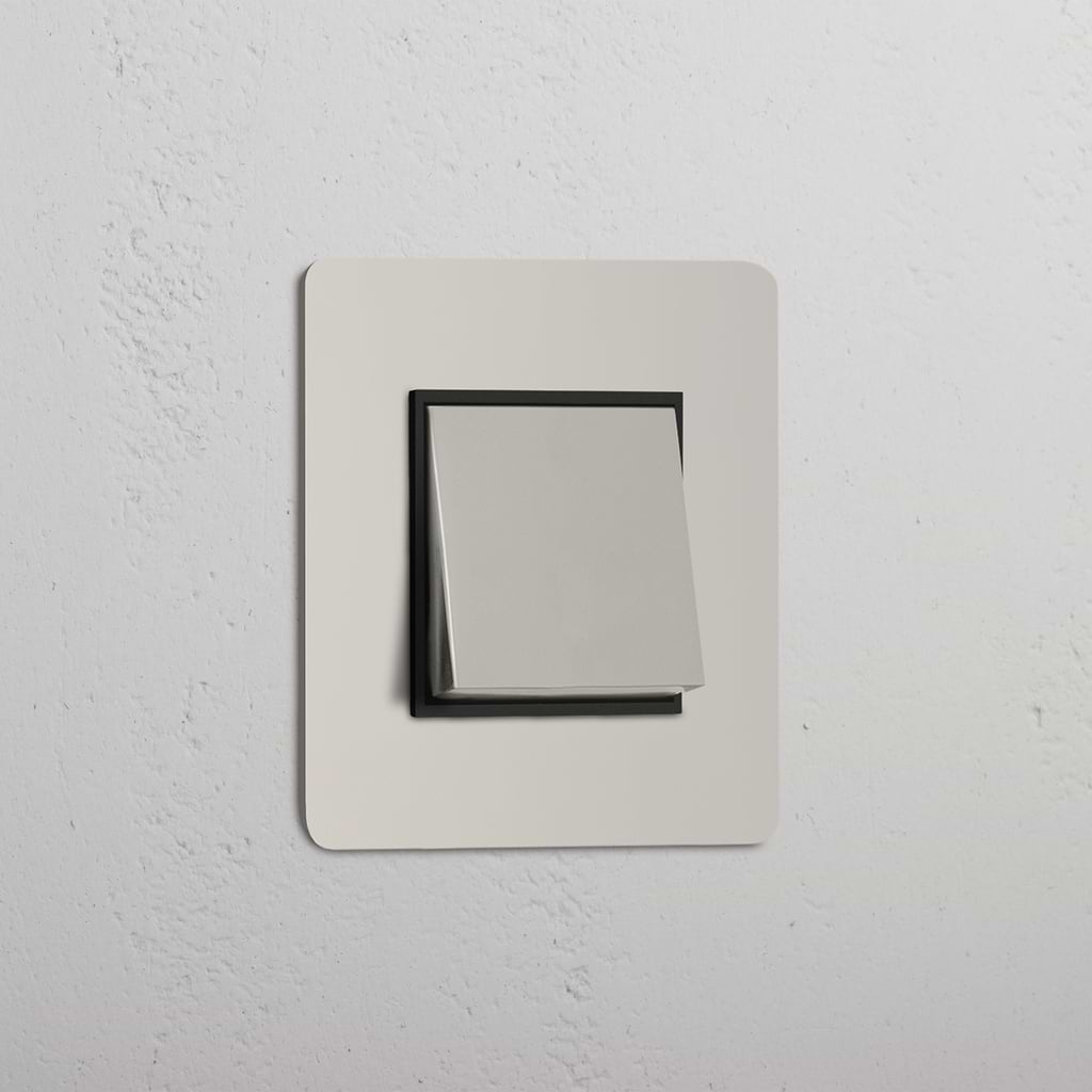 Interruptor para control de la luz: Interruptor individual de balancín en níquel pulido y negro