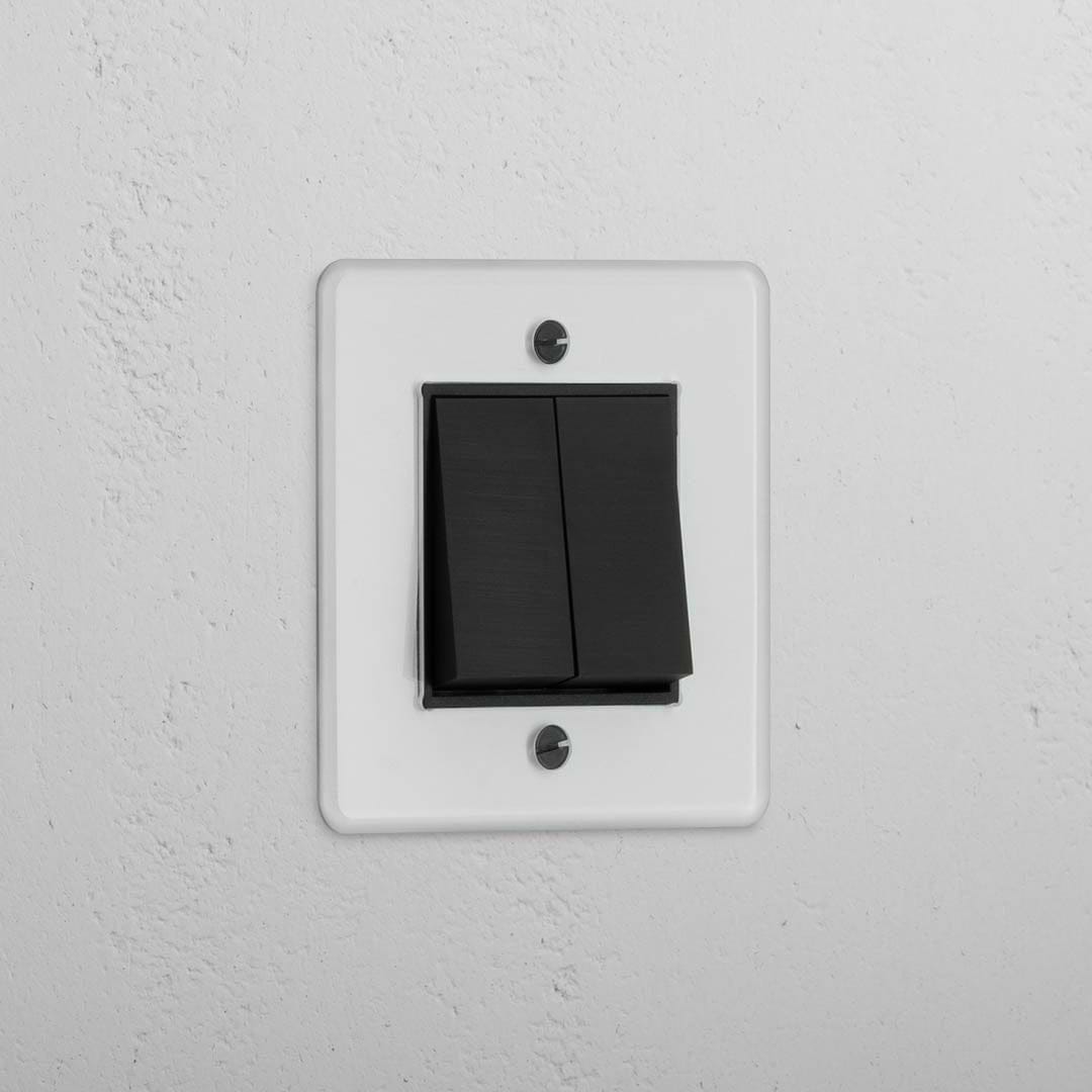 Interruptor doble de balancín en bronce y traslúcido con negro - Accesorio elegante para control de luz