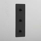 Interruptor triple de palanca en bronce con diseño vertical - Sistema de control de luces fácil de usar