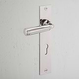 Manilla para puertas Digby con placa larga (con muelle) y cerradura europea - Níquel pulido
