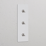 Interruptor conmutador de palanca x3 vertical (marco triple) - Pintable y níquel pulido