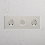 Interruptor de alta capacidad para control de la intensidad de la luz: Interruptor triple regulador de luz x3 en níquel pulido sobre fondo blanco