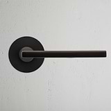 Manilla para puertas Clayton con roseta (con muelle) - Bronce