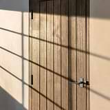 Manilla para puertas Clayton con placa corta (con muelle) - Níquel pulido