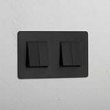 Interruptor doble de balancín elegante en bronce y negro con cuatro posiciones - Funcionamiento perfecto
