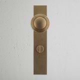 Pomo para puertas Poplar con placa larga (con muelle) y sistema giratorio - Latón antiguo