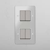 Interruptor doble de balancín en níquel pulido y traslúcido con blanco en diseño vertical con cuatro posiciones - Sistema de control avanzado de la iluminación, sobre fondo blanco