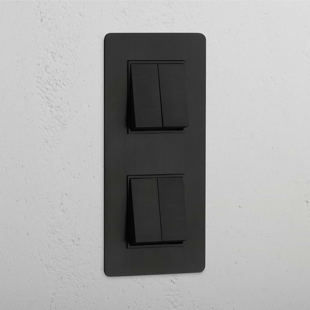 Interruptor doble de balancín de alta capacidad, en bronce y negro con diseño vertical y cuatro posiciones - Detalle para el hogar