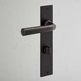 Manilla para puertas Apsley con placa larga (con muelle) y sistema giratorio - Bronce