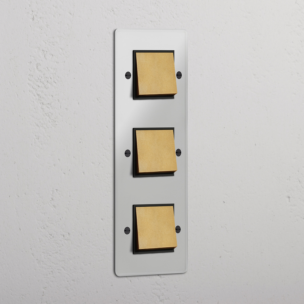 Interruptor triple de balancín en latón antiguo y traslúcido con negro, diseño vertical - Accesorio para iluminación eficiente