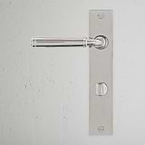 Manilla para puertas Digby con placa larga (con muelle) y sistema giratorio - Níquel pulido