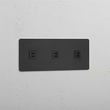 Módulo triple USB de carga rápida en bronce y negro - Accesorio de alta tecnología para el hogar