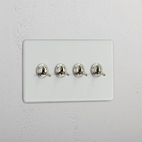 Interruptor doble de palanca en níquel pulido y traslúcido con cuatro palancas - Solución avanzada para control de luz
