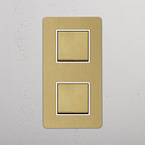 Vertical Double Rocker Switch in Antique Brass White, Two Positions on White Background