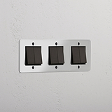Six-Position Triple Rocker Switch in Clear Bronze Black - Modern Light Control Solution