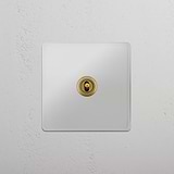 Central Position Single Toggle Switch in Clear Antique Brass - Efficient Light Management on White Background