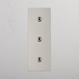 High Capacity Vertical Light Toggle Switch: Polished Nickel Triple 3x Vertical Toggle Switch on White Background