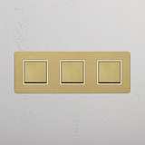 Smooth Operation with Triple Rocker Switch in Antique Brass White Design on White Background