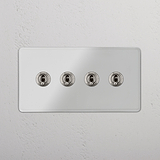Advanced Four-Levers Double Toggle Switch in Clear Polished Nickel for Light Control on White Background