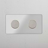 Sophisticated Double Dimmer Switch in Clear Polished Nickel for Light Intensity Management on White Background