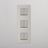 Vertical Six-Unit Rocker Switch in Polished Nickel White on White Background