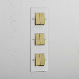 Vertical Six-Position Triple Rocker Switch in Clear Antique Brass White - Superior Light Management Solution