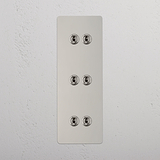 Super Capacity Vertical Light Toggle Switch: Polished Nickel Triple 6x Vertical Toggle Switch on White Background