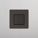 Intermediate Rocker Switch in Bronze Black on White Background