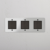 Comprehensive Triple Rocker Switch in Clear Bronze Black for Light Management on White Background