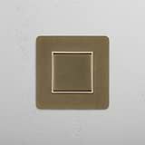 Easy-to-Use Central Rocker Switch in Antique Brass White on White Background