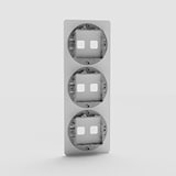 Vertical Six-Position Triple Switch Plate in Clear for Space-Saving Light Control - on White Background