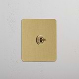 Central Single Toggle Switch in Antique Brass