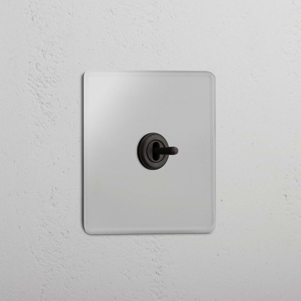 Central Single Toggle Switch in Clear Bronze - Efficient Light Control System