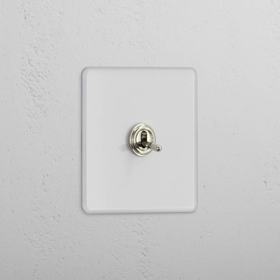 Retractive Single Toggle Switch in Clear Polished Nickel - Convenient Lighting Management Tool