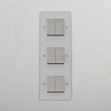 Vertical Six-Way Triple Rocker Switch in Clear Polished Nickel White - Superior Light Management Tool on White Background