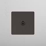 Central Bronze Single Toggle Switch - Perfect Solution for Light Control on White Background