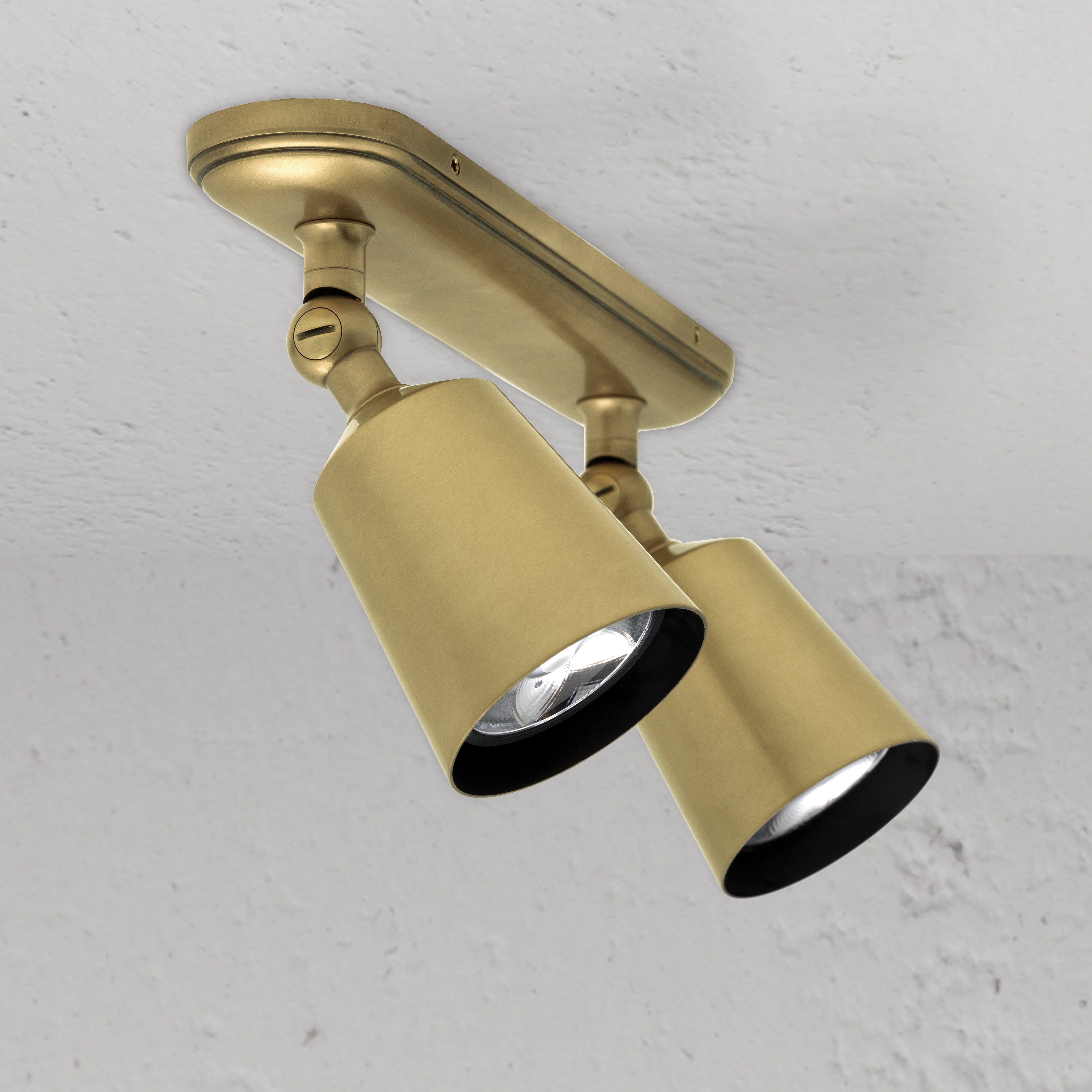 Antique Brass Designer Baylis Double Spotlight on White Background