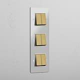 Vertical Six-Position Triple Rocker Switch in Clear Antique Brass White - Superior Light Management Solution