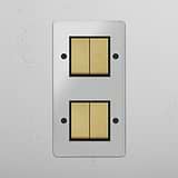 High-Capacity Double Vertical Rocker Switch in Clear Antique Brass Black on White Background