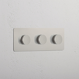 Variateur Multidirectionnel x3 sur plaque triple en nickel poli, interrupteurs variateurs muraux rectangulaires.