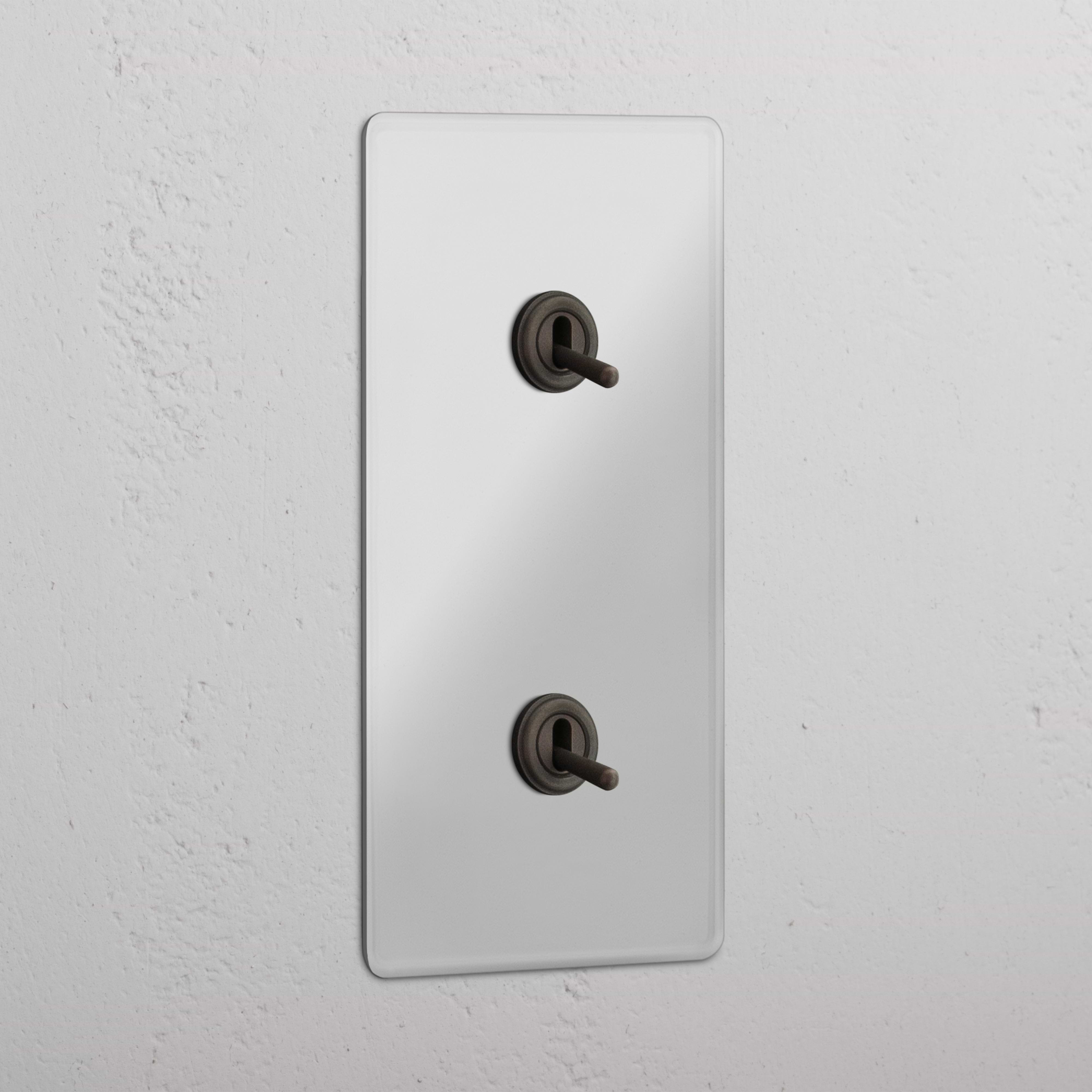Vertical Double Toggle Switch in Clear Bronze - User-friendly Light Management Tool