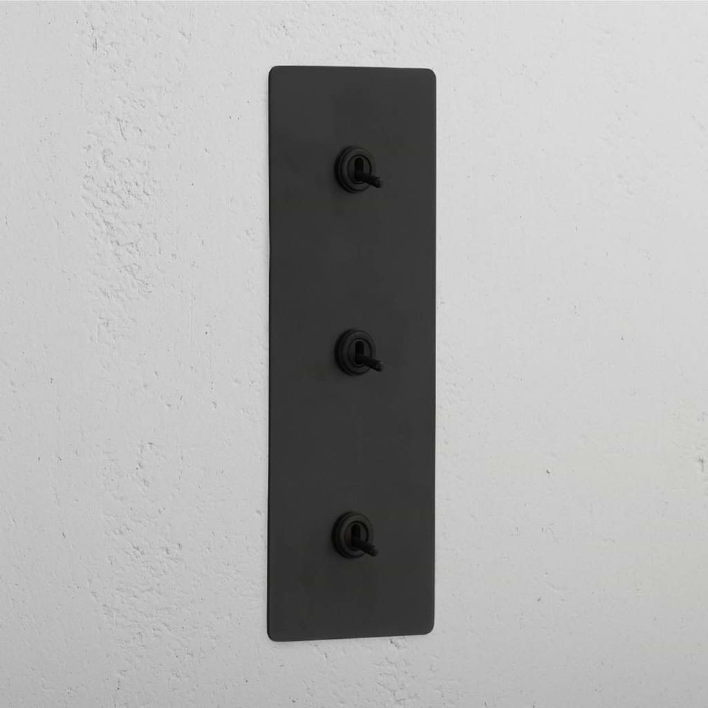 Triple Vertical Toggle Switch in Bronze - User-Friendly Light Control System