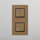Four-Switch Vertical Double Rocker, Antique Brass Black Hue on White Background