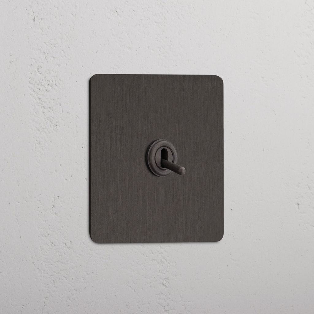 Intermediate Bronze Single Toggle Switch - Versatile Light Management Tool